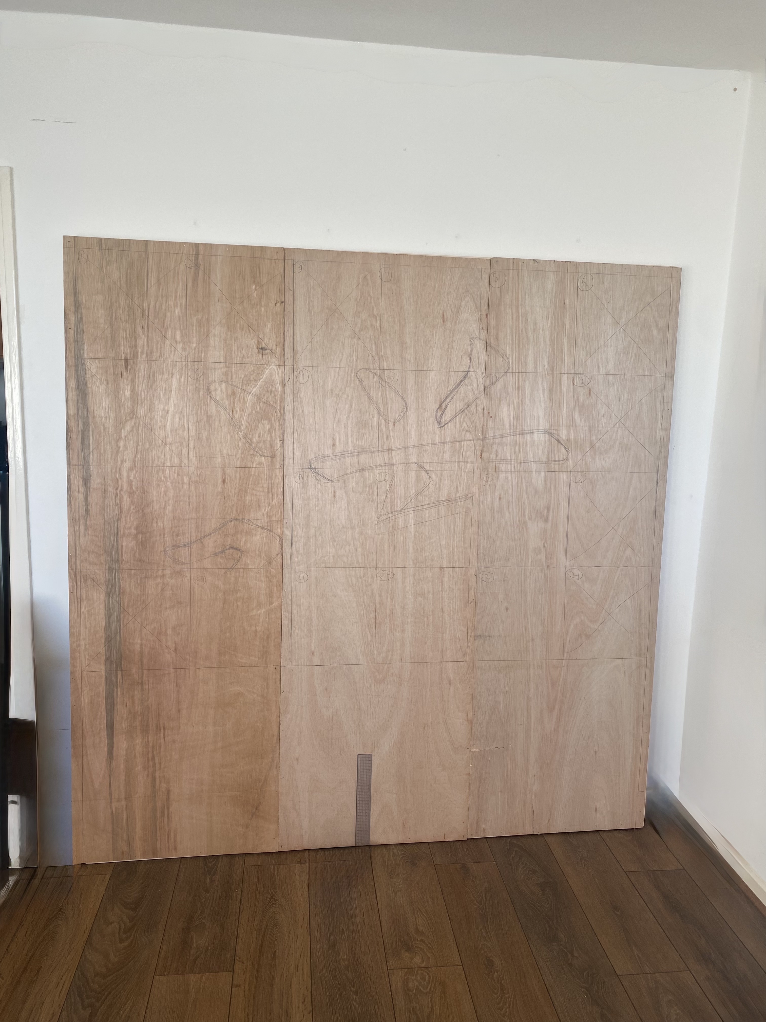 Wooden oak and plywood backing panels prepared as the frame for the Dao art piece.